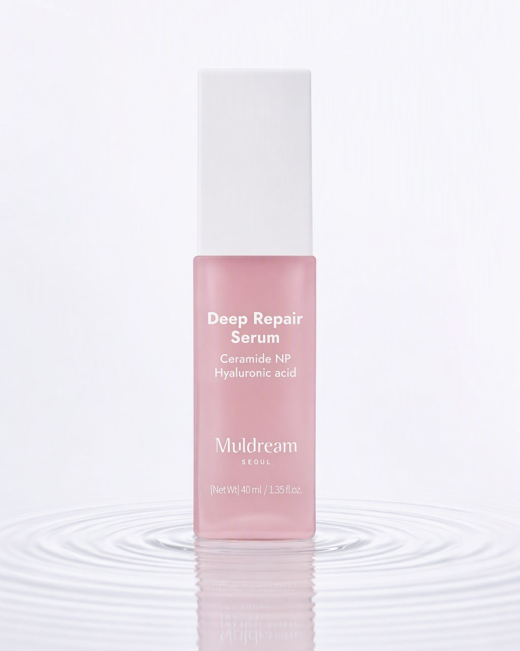 Deep Repair Serum — su üstünde, yayılan halkalar